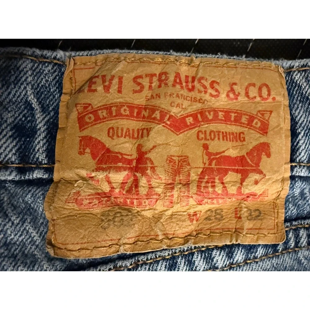 Levi's 502 Taper Fit Jeans Mens 28x32 Light Wash Blue Red Tab Denim Pants